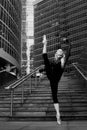 Ballet dancer on city street background. Artistic. Black and white. Royalty Free Stock Photo