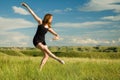 Ballerina in field Royalty Free Stock Photo