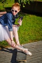 Ballerina hipster sitting on the bench. Royalty Free Stock Photo