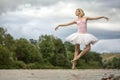 Ballerina jumping above river Royalty Free Stock Photo