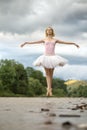 Ballerina jumping above river Royalty Free Stock Photo