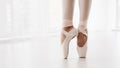 Ballerina Legs On Pointe Closeup. Classic And Modern Ballet Conc