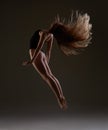 Ballerina with long hair jumping Royalty Free Stock Photo