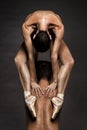 Ballerina in Pointe Shoes, Acrobatic Couple Posing over Gray Background, Flexible and Strong Modern Ballet Dancers