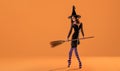 A ballerina on pointe shoes in a black witch costume in a hat and with a broom dances on an orange background