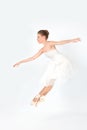 the ballerina in pointes and a dress dances on a white background Royalty Free Stock Photo