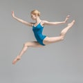 Ballerina posing in jump