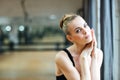 Ballerina resting in ballet class