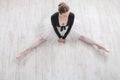 Ballerina sit on floor in ballet class, top view Royalty Free Stock Photo