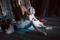 Ballerina sitting on the warm-up backstage Royalty Free Stock Photo
