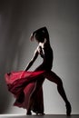 Ballerina with a waving red dress Royalty Free Stock Photo