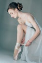 ballerina wearing ballet shoes on feet