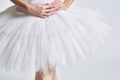 Ballerina white tutu dance exercise performance light background