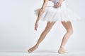 Ballerina white tutu dance exercise performance light background Royalty Free Stock Photo