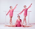 Ballerinas stretching on the bar Royalty Free Stock Photo