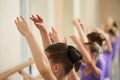 Ballerinas training at class, cropped image. Royalty Free Stock Photo