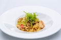 Ballerine pasta with shrimps in white plate
