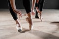 The ballet concept. Pointe shoes close up. Young ballerina girls. Women at the rehearsal in black bodysuits. Prepare a