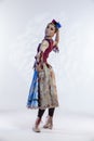 Ballet Concepts. Asian Japanese Female Ballet Dancer In Stage Outfit Costume Posing in Dance Pose With Patterns Over White