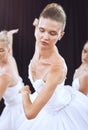 Ballet, dance and art with a woman ballerina or dancer dancing on a theater stage during a performance. Creative Royalty Free Stock Photo