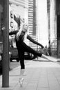 Ballet dancer on the city street. Ballerina