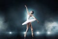 Ballet dancer dancing on the stage in theatre Royalty Free Stock Photo