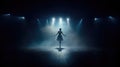 Ballet dancer on dark empty stage with spotlights and smoke Royalty Free Stock Photo