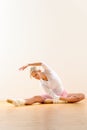 Ballet dancer in leaning posture exercise studio Royalty Free Stock Photo