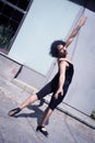 Dancer with black leotard and ballet tips