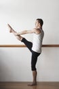 Ballet Dancer Practicing At Bar