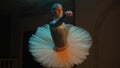 Ballet dancer preparing and stretching before performance Royalty Free Stock Photo