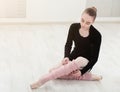 Ballet dancer wearing gaiters closeup