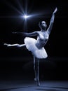 Ballet dancer in white tutu posing on one leg Royalty Free Stock Photo