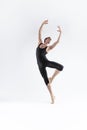 Ballet Dancer Young Man in Black Dance Suit Posing in Ballanced Dance Pose Studio On White