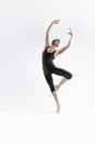 Ballet Dancer Young Man in Black Dance Suit Posing in Ballanced Dance Pose Studio On White