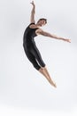 Ballet Dancer Young Man in Black Dance Suit Posing in Flying Ballanced Dance Pose Studio