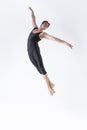Ballet Dancer Young Man in Black Dance Suit Posing in Flying Ballanced Dance Pose Studio