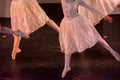 Ballet Dancers with Classical Dresses performing a ballet on Blur Background Royalty Free Stock Photo