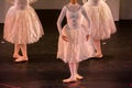 Ballet Dancers with Classical Dresses performing a ballet on Blur Background Royalty Free Stock Photo