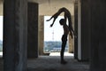 Ballet dancers posing at unfinished building Royalty Free Stock Photo