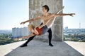 Ballet dancers posing at unfinished building Royalty Free Stock Photo