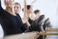 Ballet Dancers Practicing At The Barre