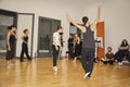 Ballet dancers rehearsing on parquet