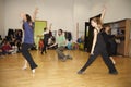 Ballet dancers rehearsing on parquet