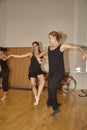 Ballet dancers rehearsing on parquet