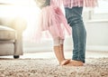 Ballet, feet and father with girl child in a living room with love, learning or dance in their home together. Family Royalty Free Stock Photo