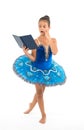 Ballet girl with book. Small girl study and train, education. Small ballerina reading book. She is in love with ballet