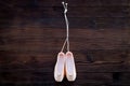 Ballet pointe shoes on dark wooden background top view copy space Royalty Free Stock Photo