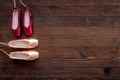 Ballet pointe shoes on dark wooden background top view copy space Royalty Free Stock Photo