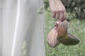 Ballet shoes in the hand of the girl